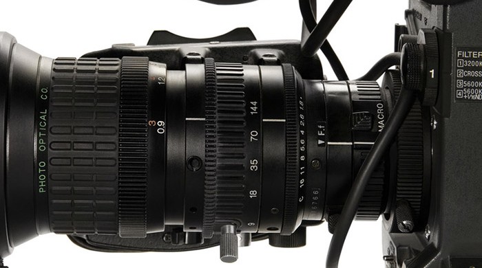 Professional digital video camera, isolated on white background